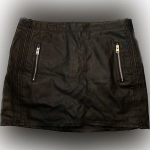Black leather mini skirt.